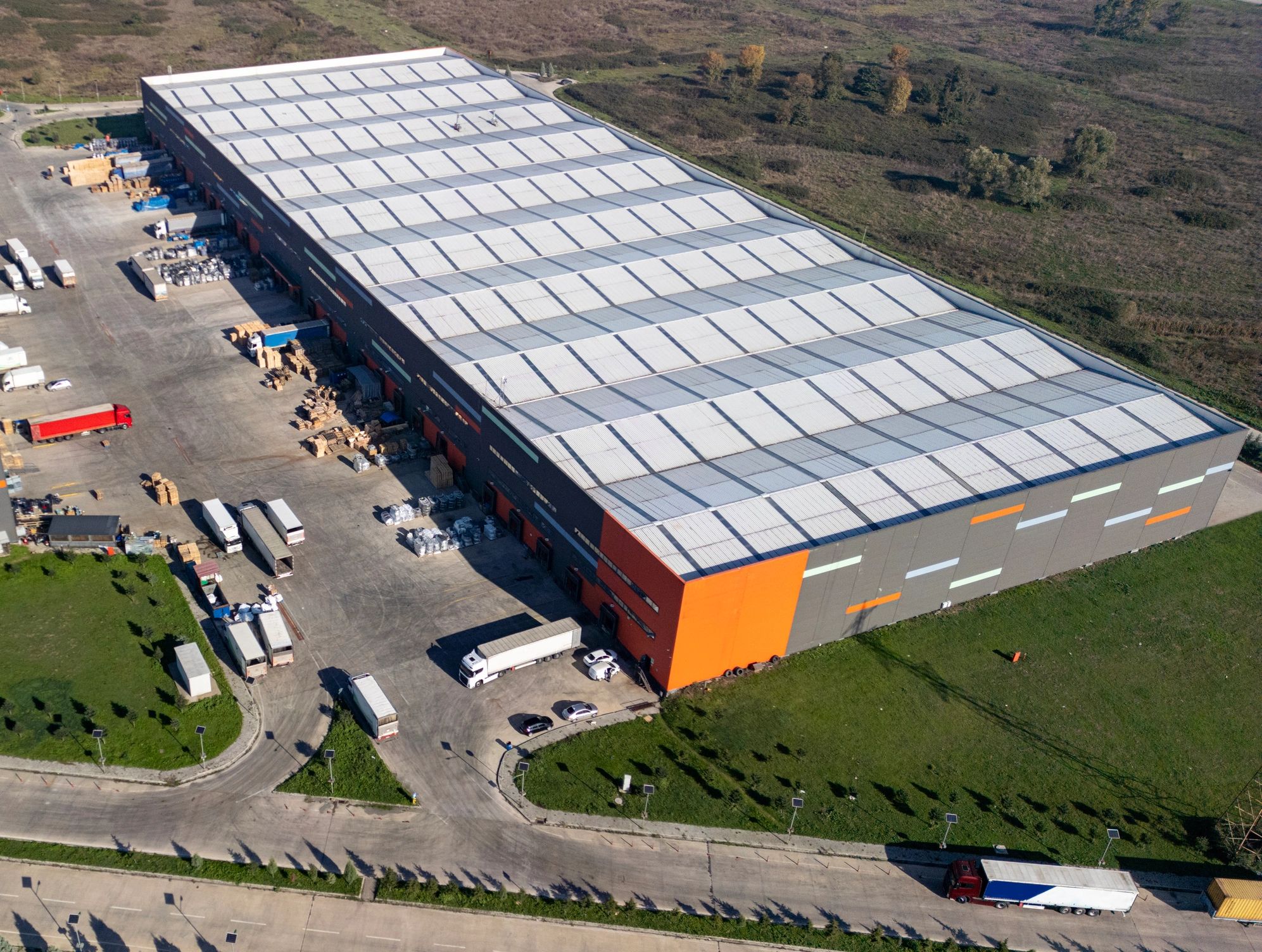 Modern logistics center with trucks and distribution operations